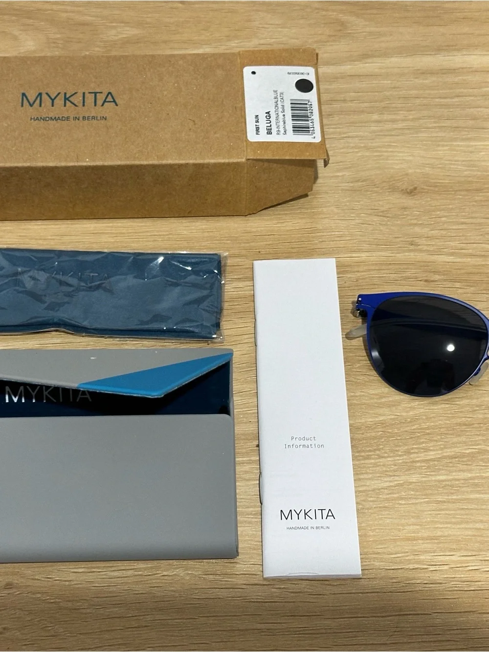 MYKITA Blue Round Sunglasses with Dark Lenses